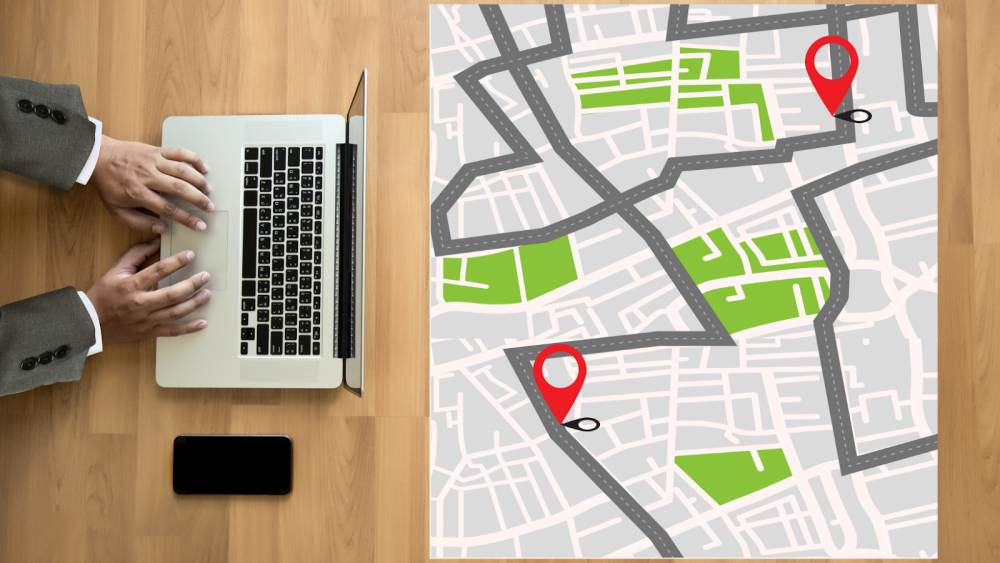 GPS App Clock Time Tracking on laptop and a map